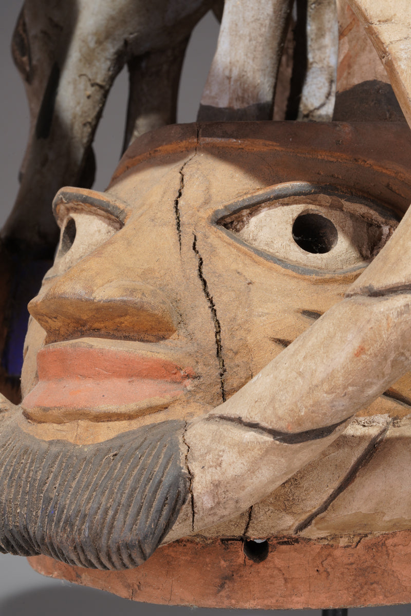 A colourful Gelede helmet mask