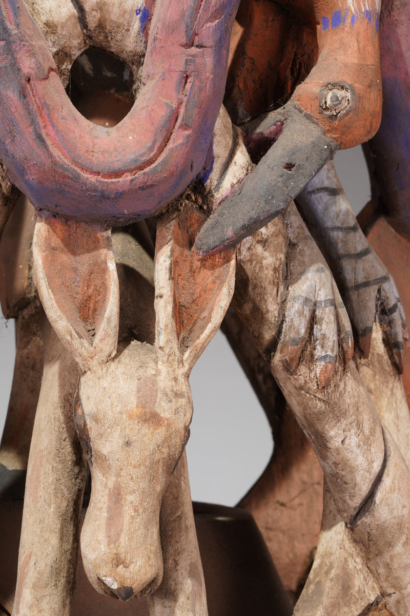 A colourful Gelede helmet mask