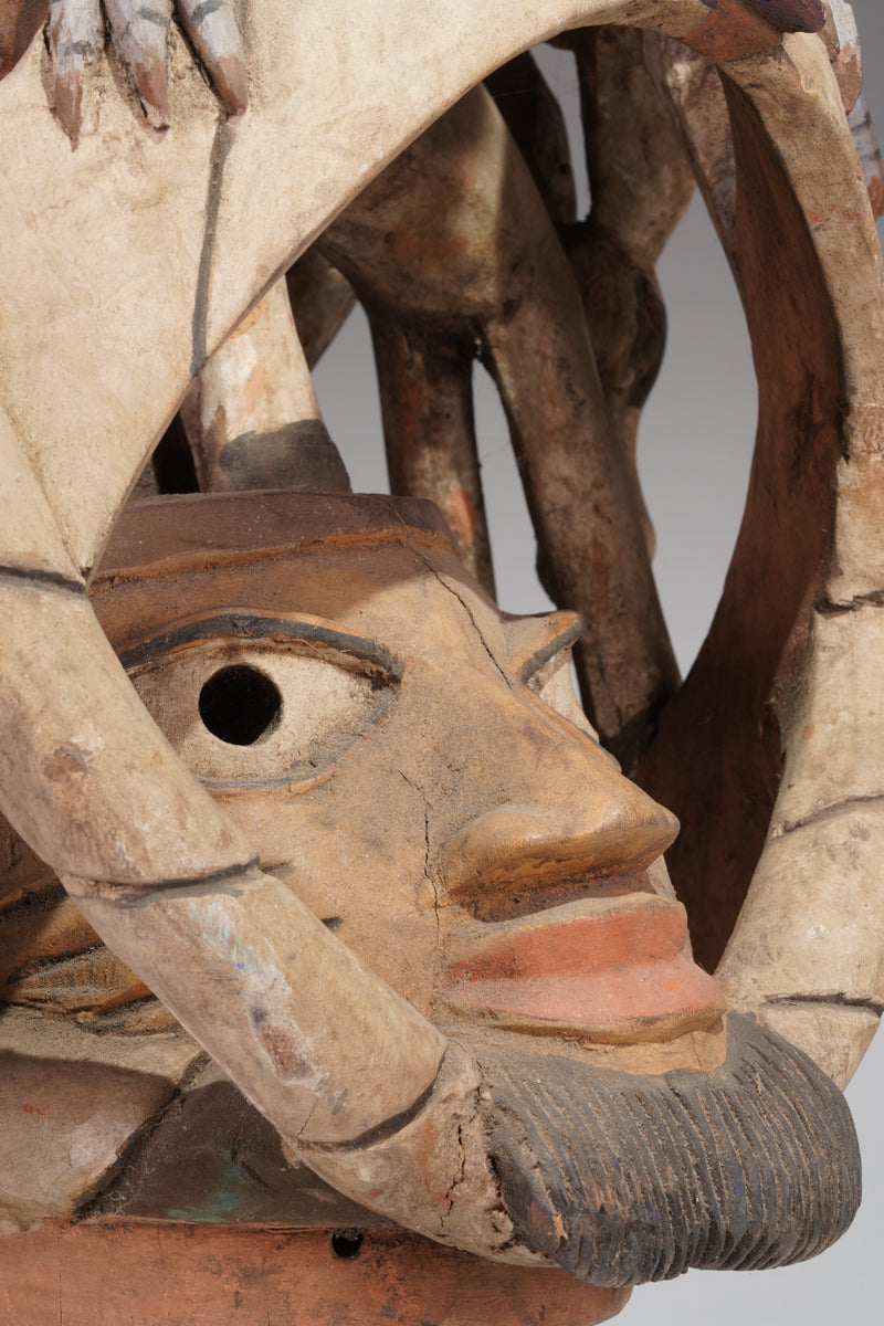 A colourful Gelede helmet mask