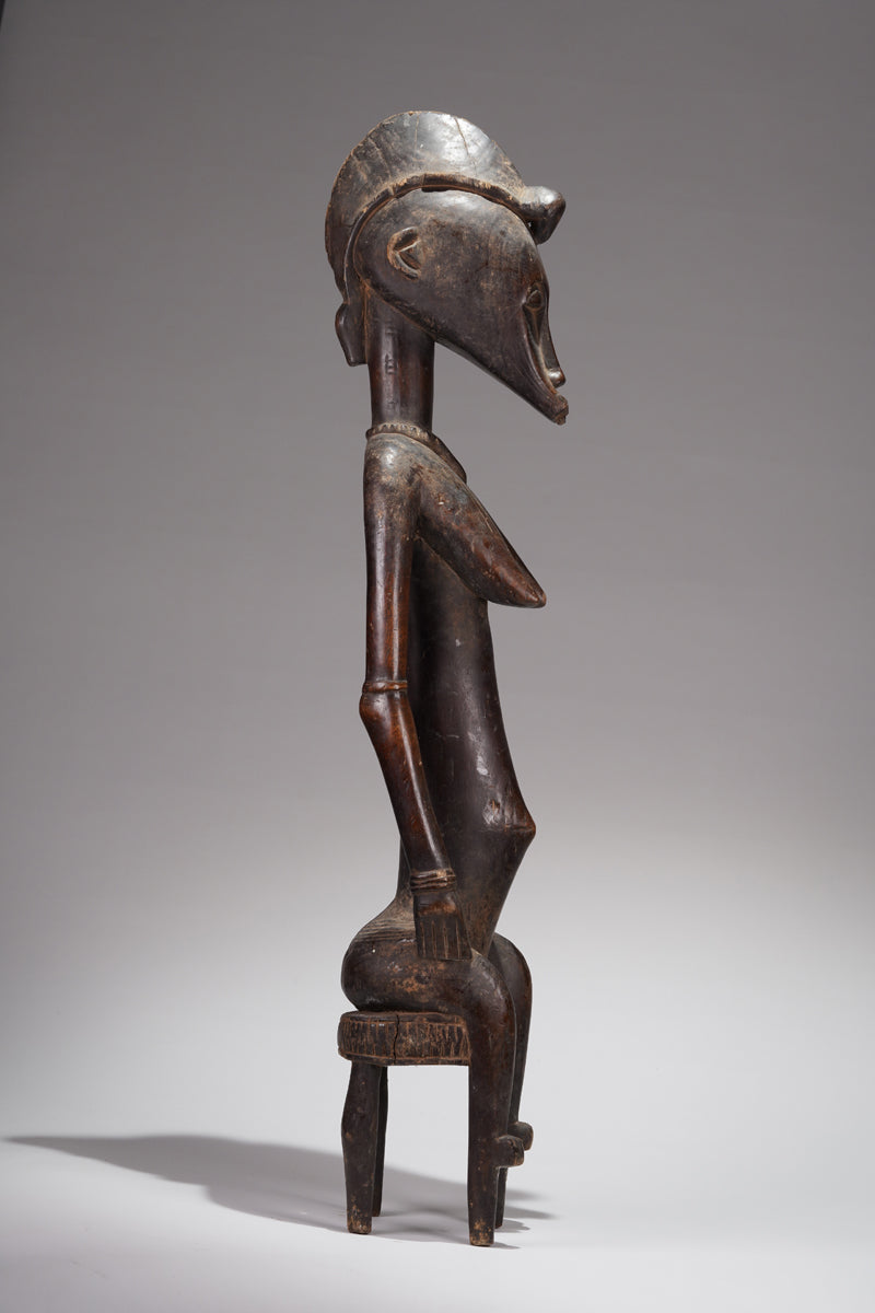 A female Senufo figure from Ivory Coast