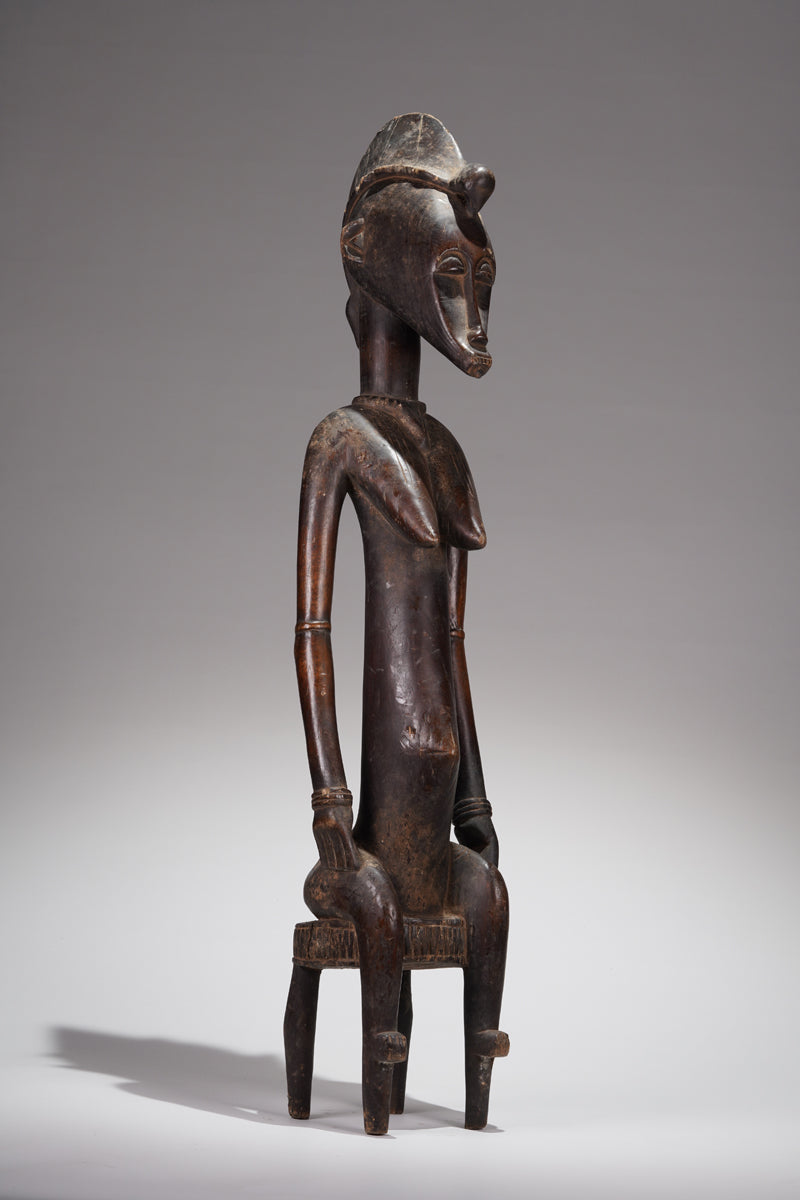 A female Senufo figure from Ivory Coast