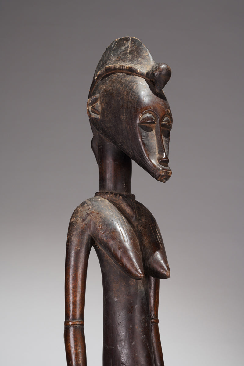 A female Senufo figure from Ivory Coast