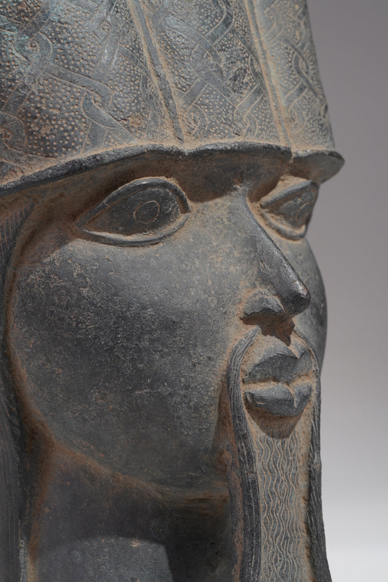 A Bronze head of a Portuguese in the style of Benin