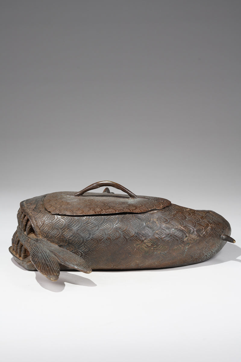 A Kola nut container in the style of Benin