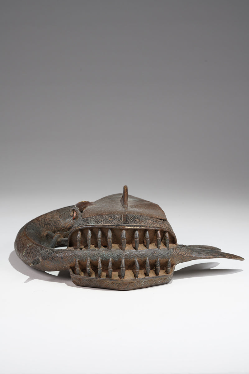 A Kola nut container in the style of Benin