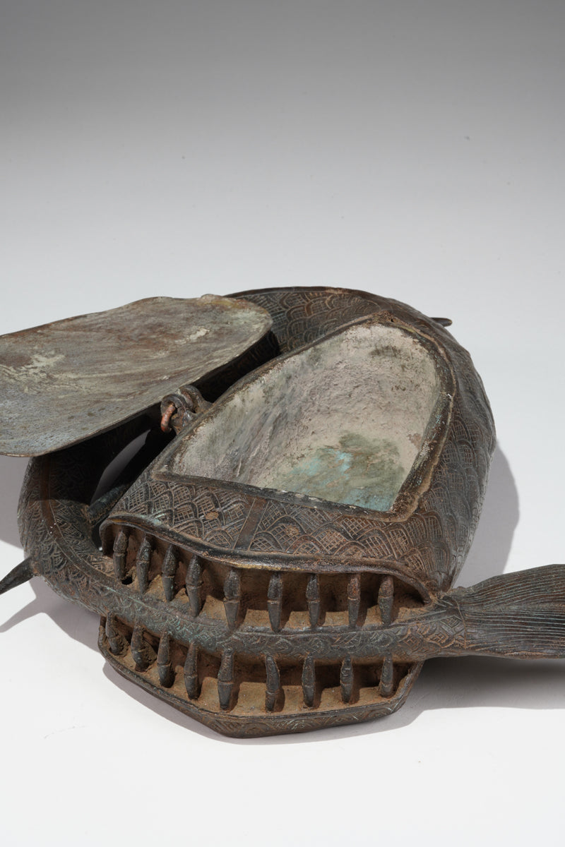 A Kola nut container in the style of Benin