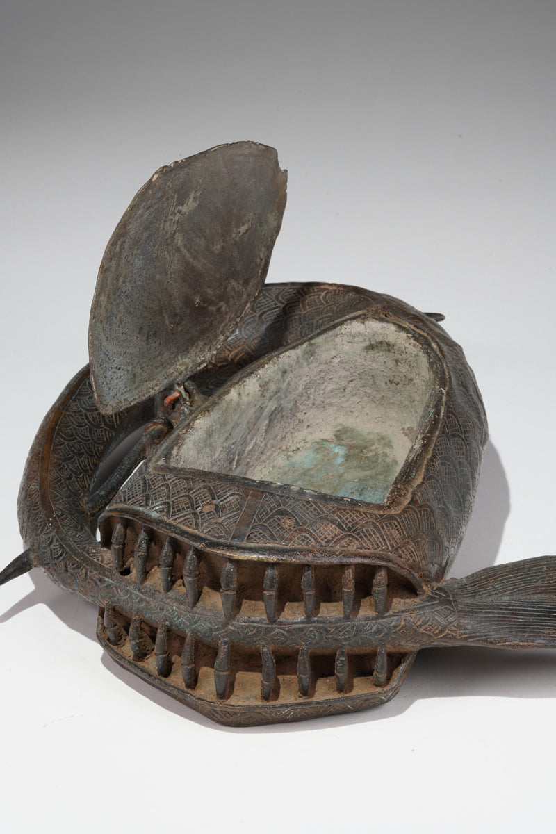A Kola nut container in the style of Benin