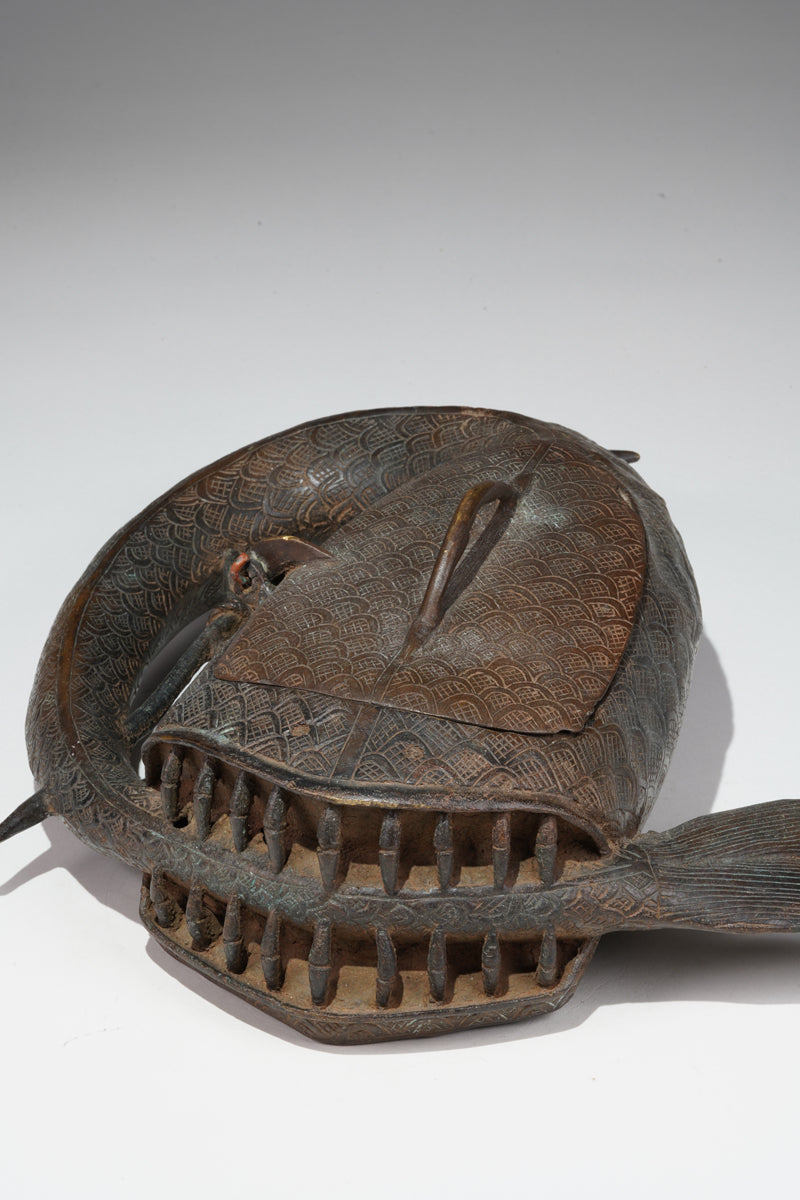 A Kola nut container in the style of Benin