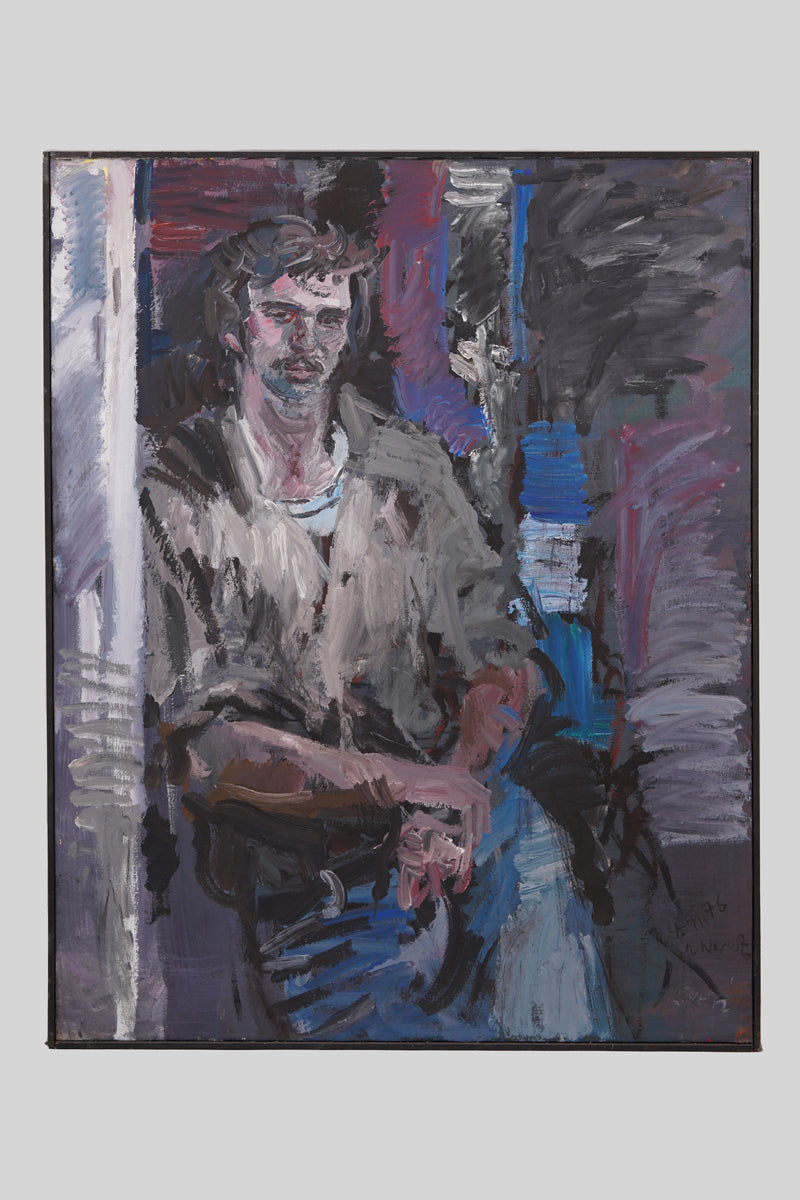 A middle-aged man in a casual and relaxed pose