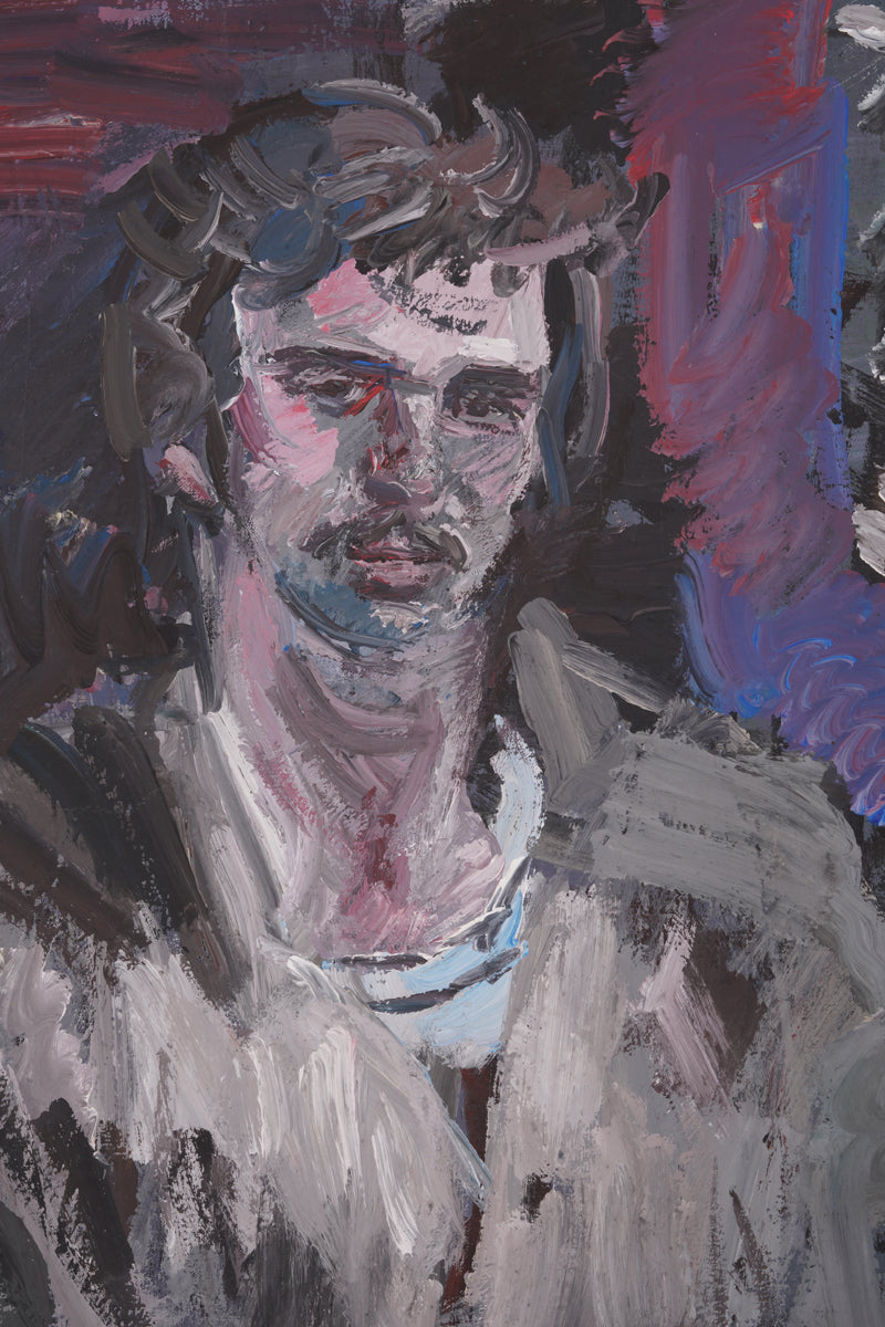 A middle-aged man in a casual and relaxed pose