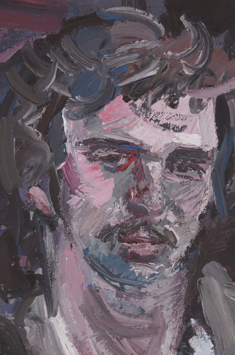 A middle-aged man in a casual and relaxed pose