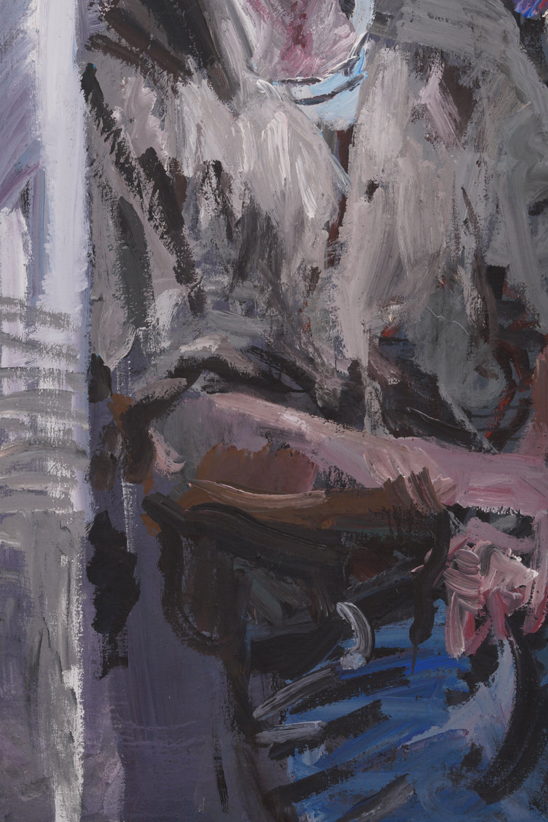 A middle-aged man in a casual and relaxed pose