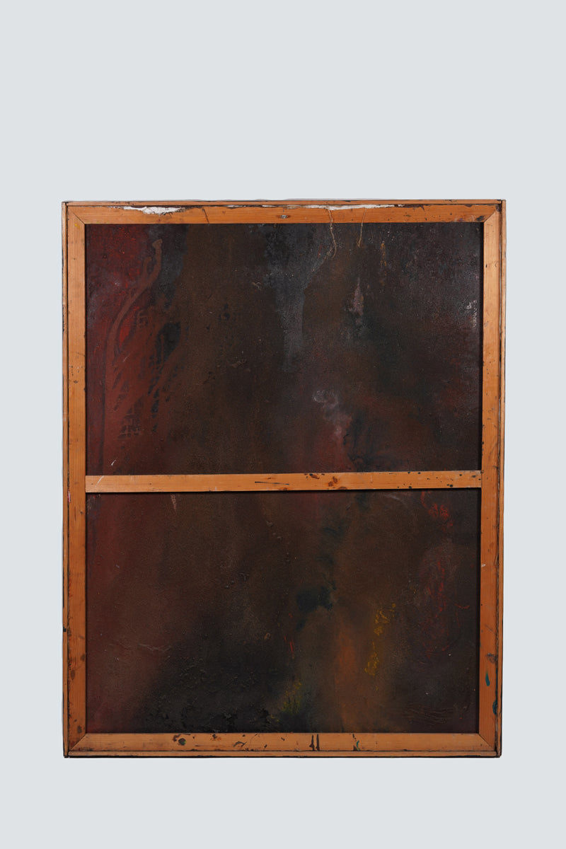 A middle-aged man in a casual and relaxed pose