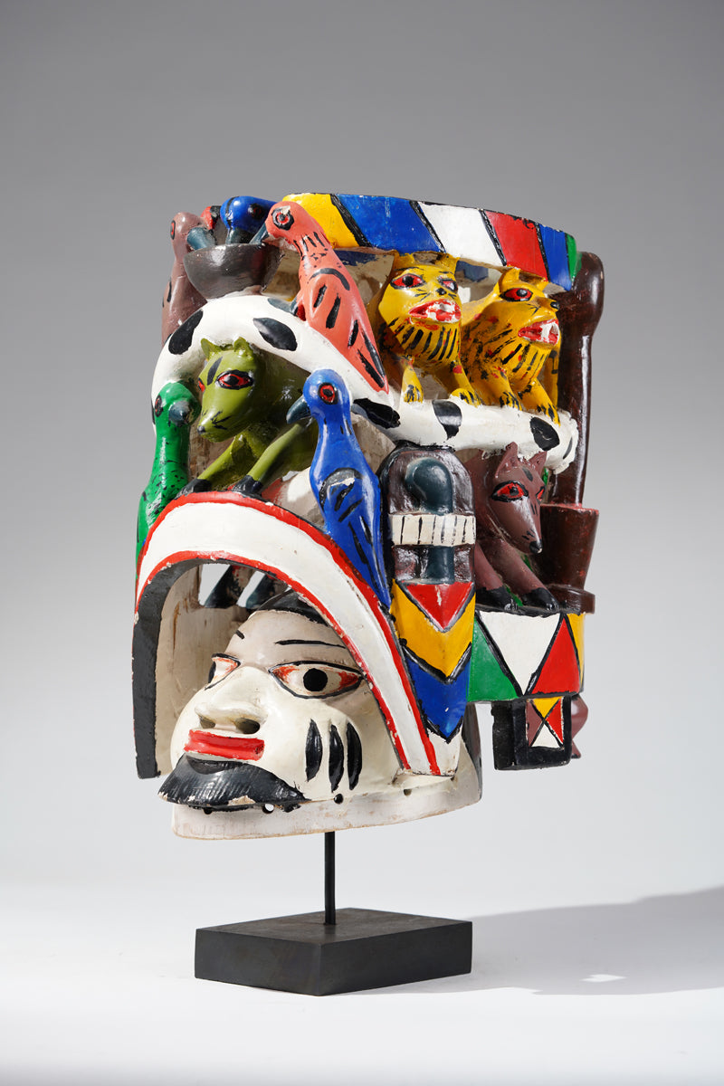 A colourful Yoruba Gelede helmet mask