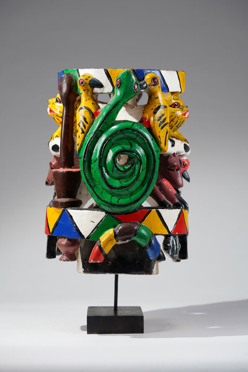 A colourful Yoruba Gelede helmet mask