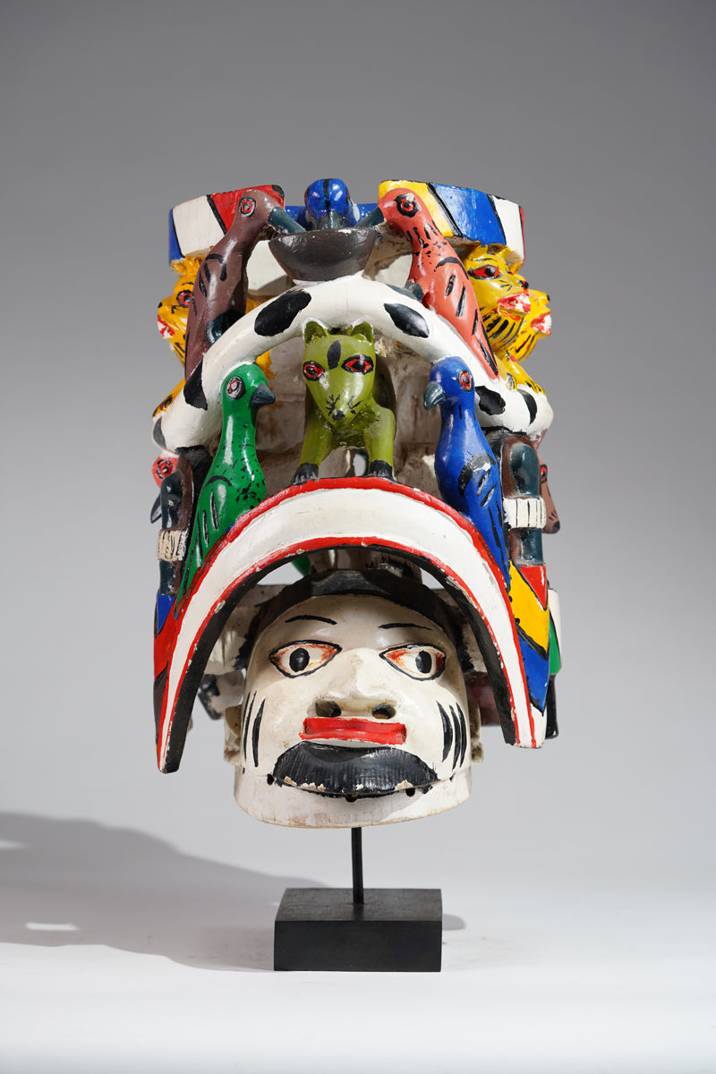 A colourful Yoruba Gelede helmet mask