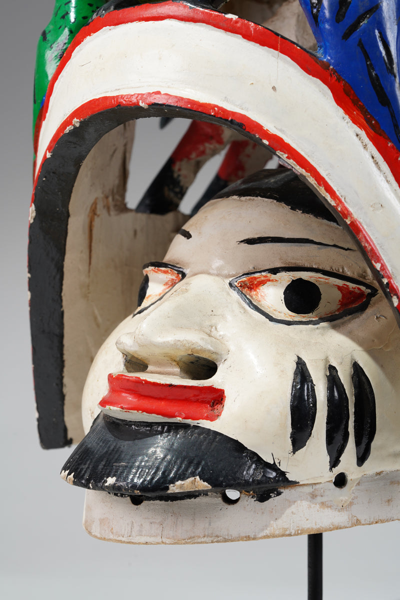 A colourful Yoruba Gelede helmet mask