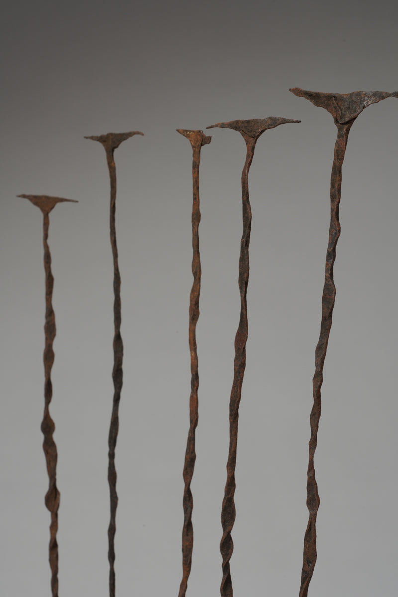 A set of five Kisi iron "pennies" currency