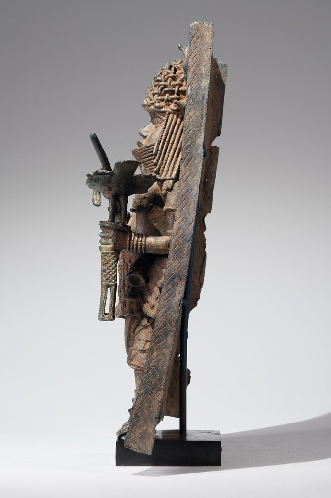 A brass plate probably depicting Oba Esigie in the style of Benin