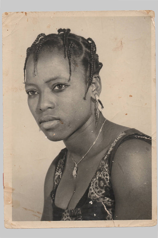 Sixteen original photos by Malick Sidibé and others
