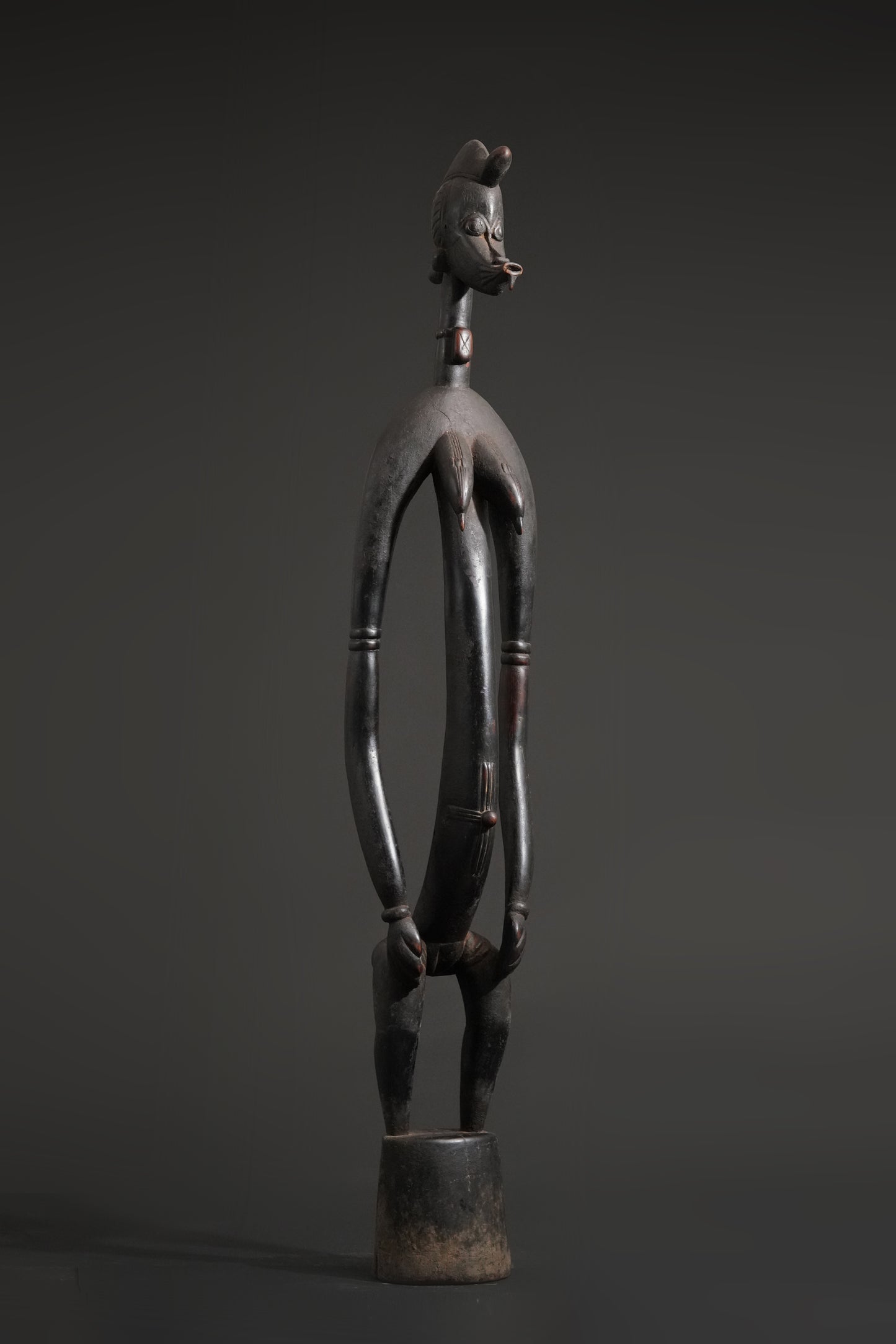 A female Senufo Rhythm Pounder
