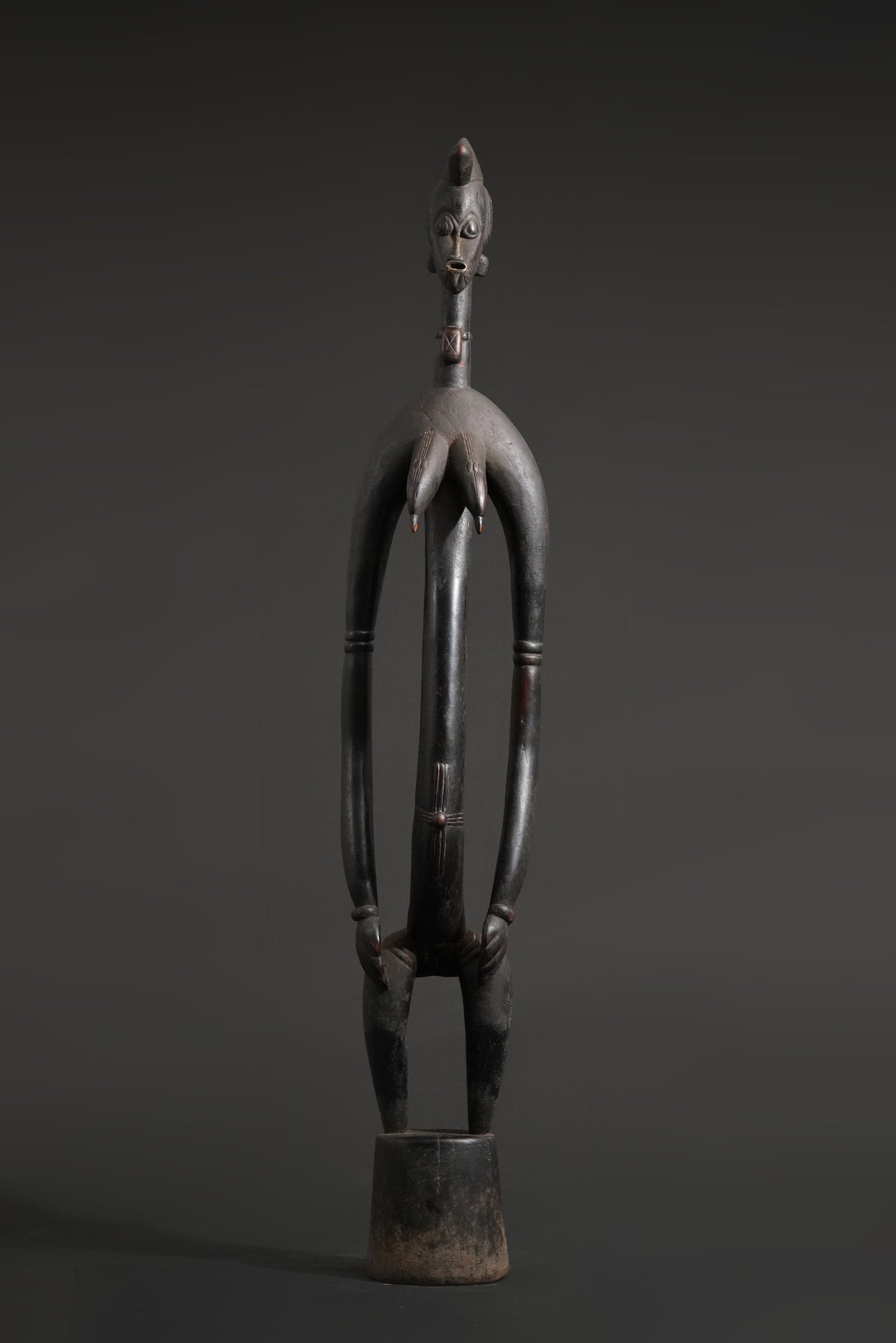 A female Senufo Rhythm Pounder