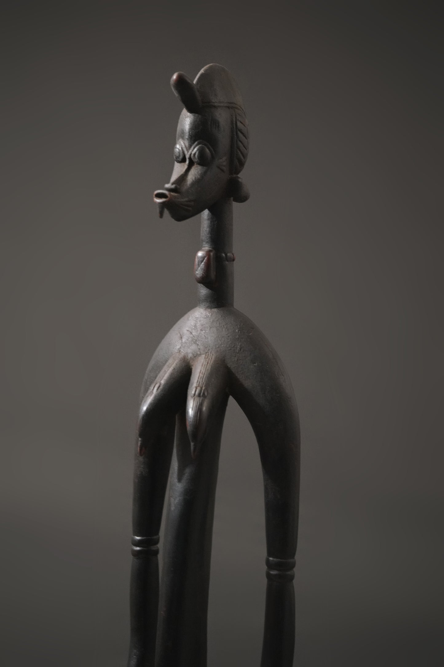A female Senufo Rhythm Pounder