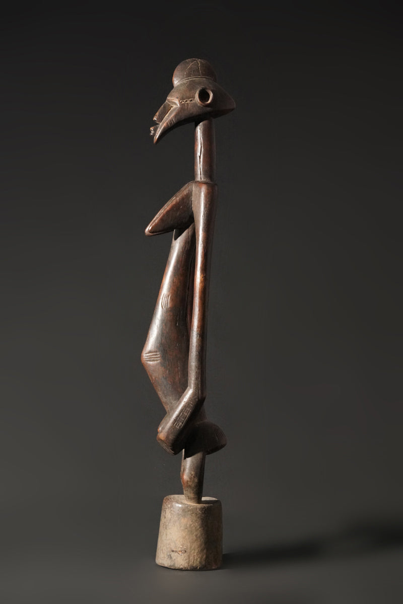 A high aged female Senufo Rhythm Pounder, called "Deblé