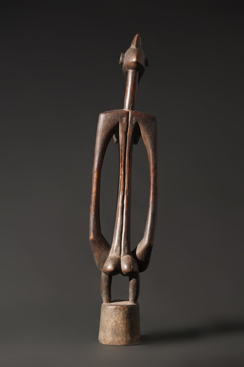 A high aged female Senufo Rhythm Pounder, called "Deblé