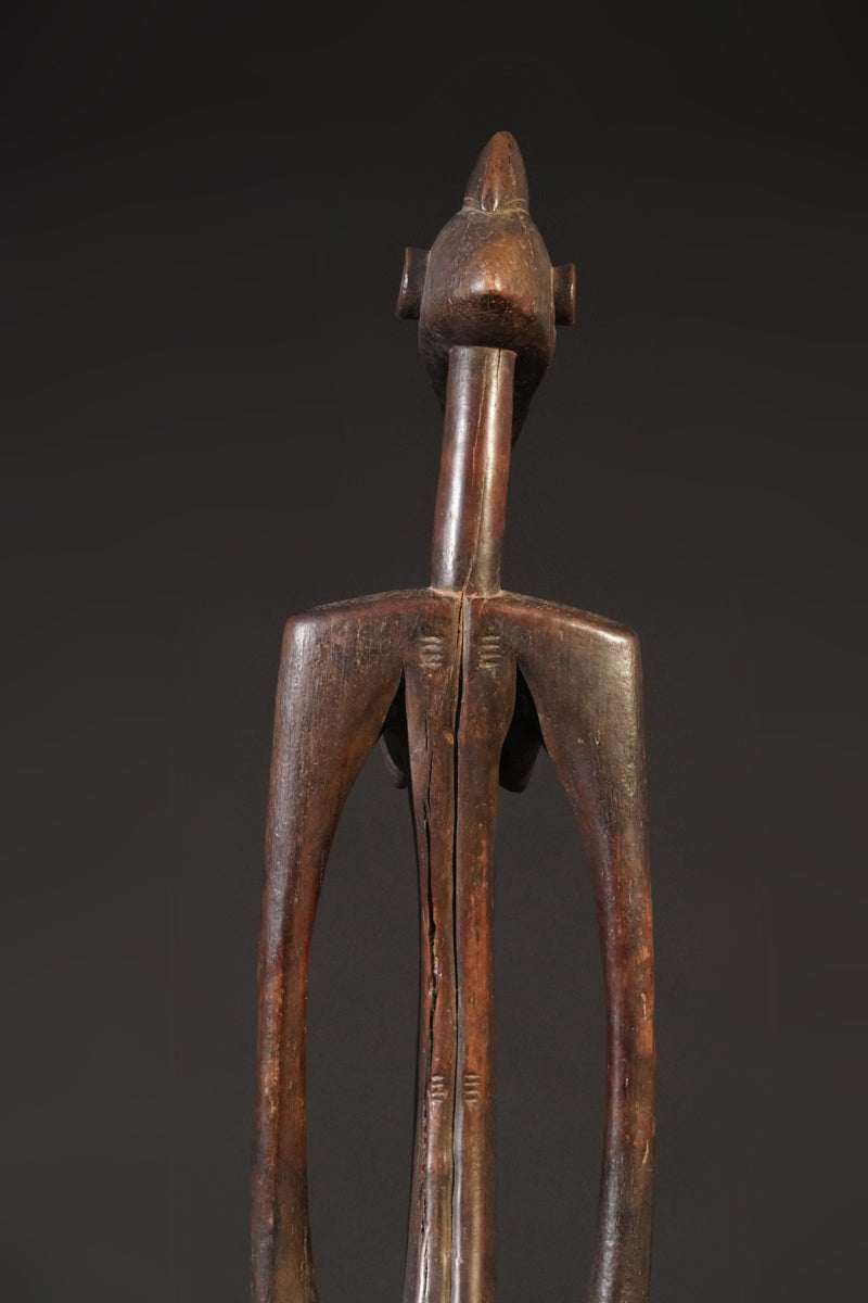 A high aged female Senufo Rhythm Pounder, called "Deblé