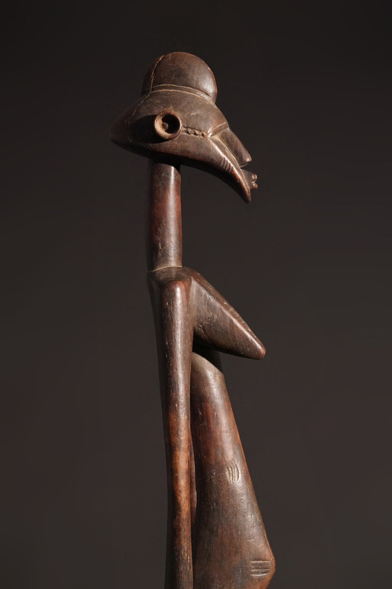 A high aged female Senufo Rhythm Pounder, called "Deblé