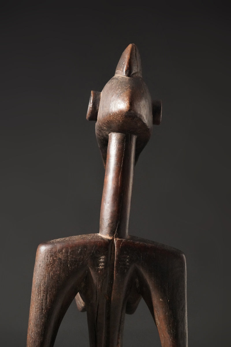 A high aged female Senufo Rhythm Pounder, called "Deblé
