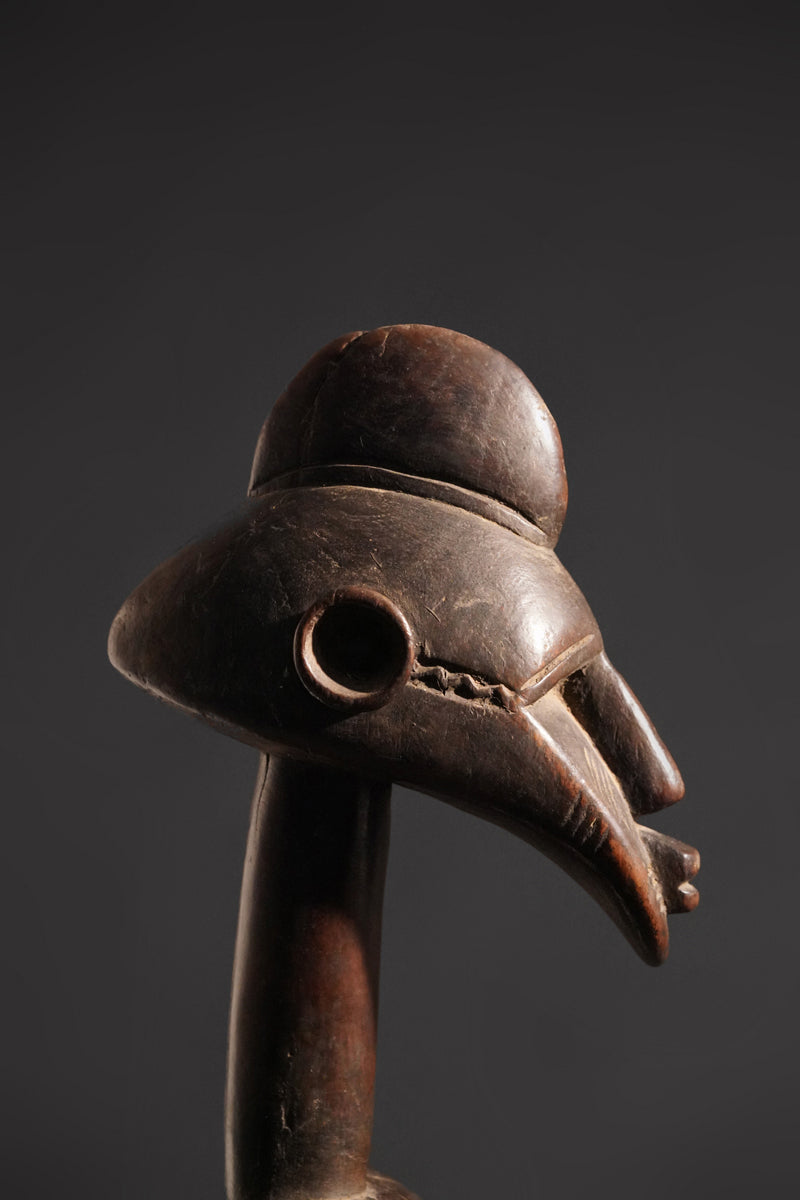 A high aged female Senufo Rhythm Pounder, called "Deblé