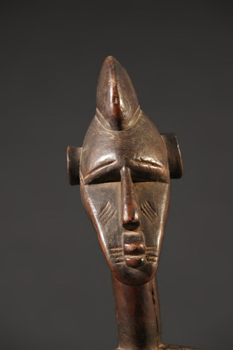 A high aged female Senufo Rhythm Pounder, called "Deblé