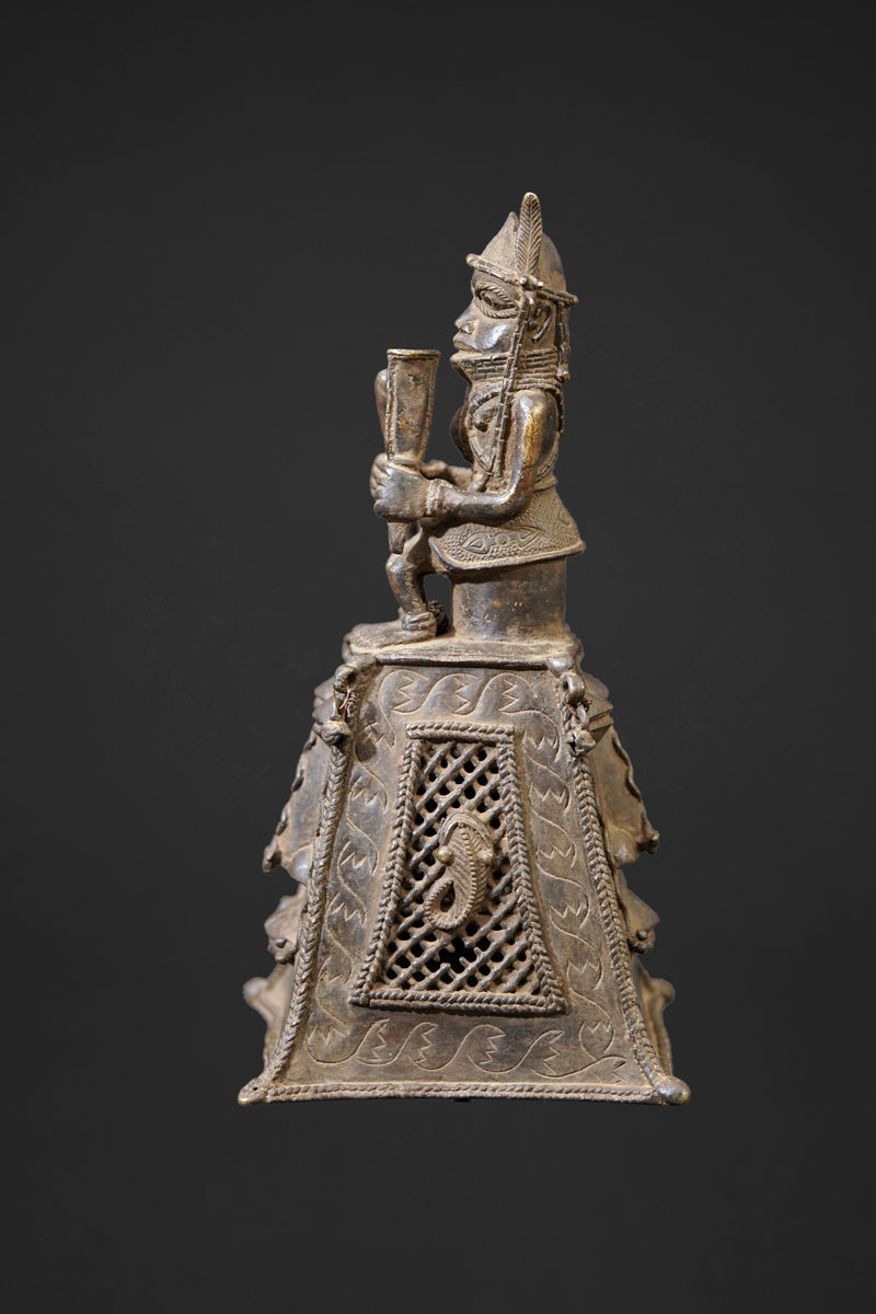 A bronze bell in the style of Benin