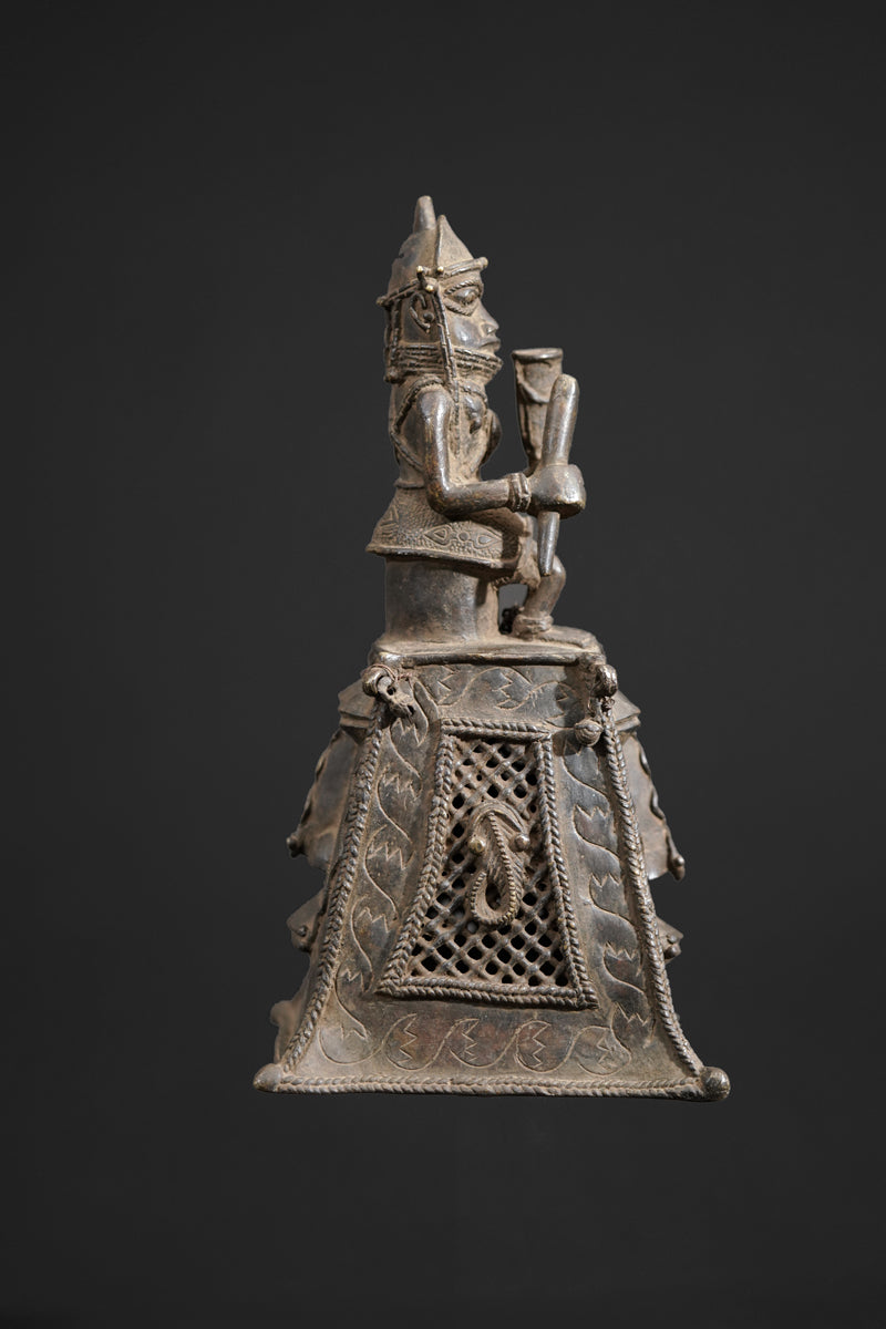 A bronze bell in the style of Benin