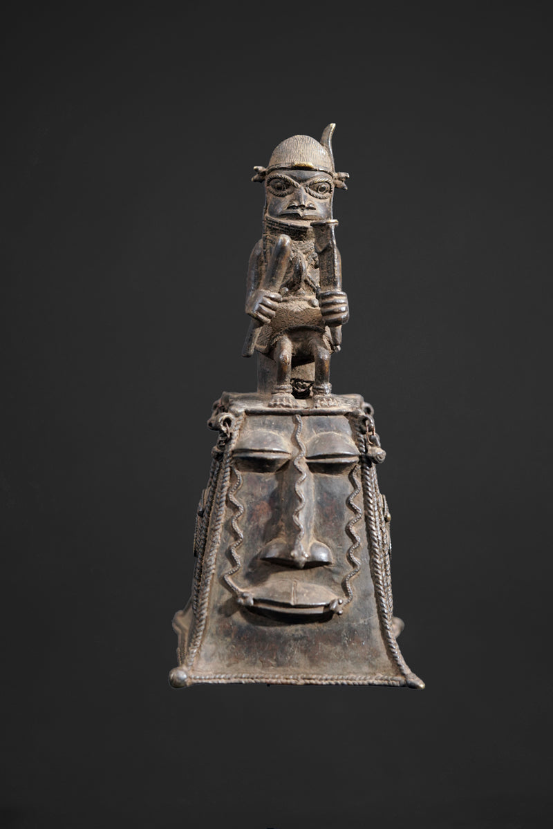 A bronze bell in the style of Benin