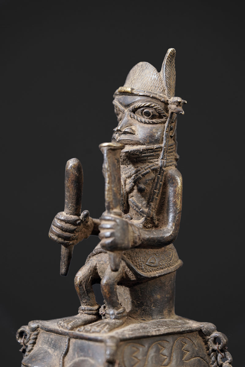 A bronze bell in the style of Benin