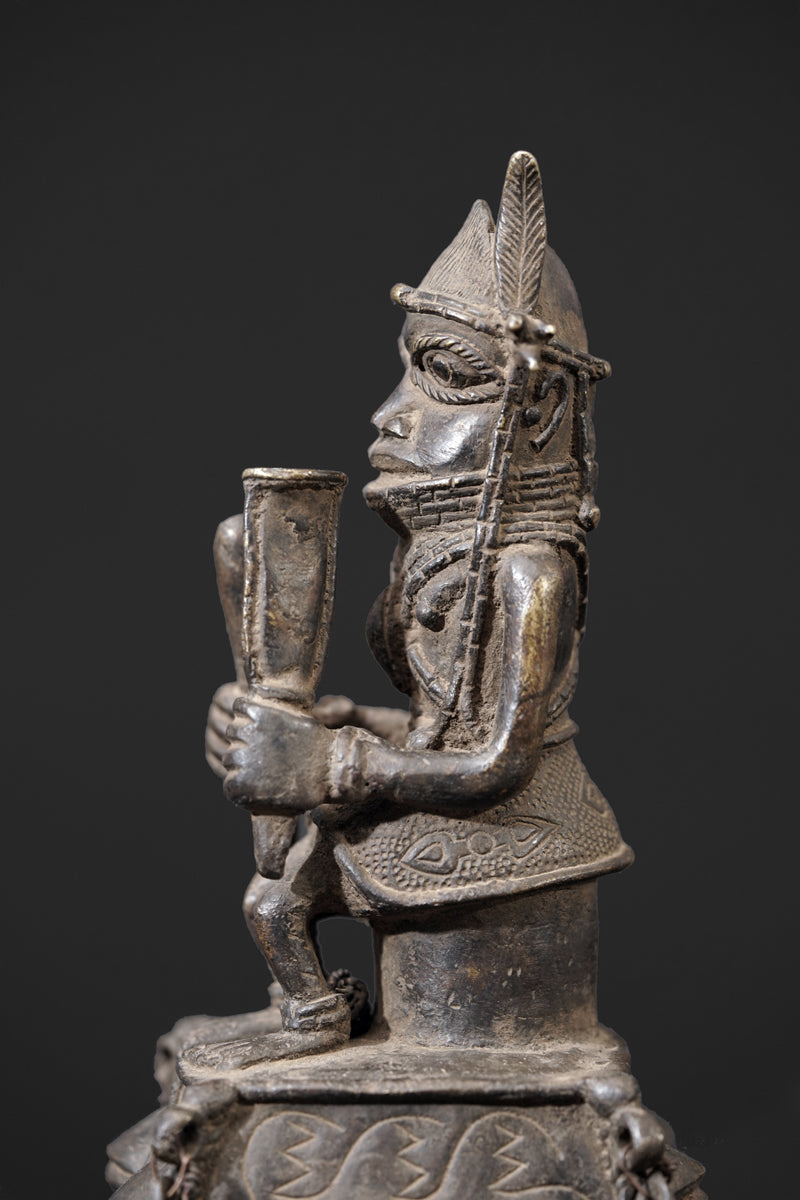 A bronze bell in the style of Benin