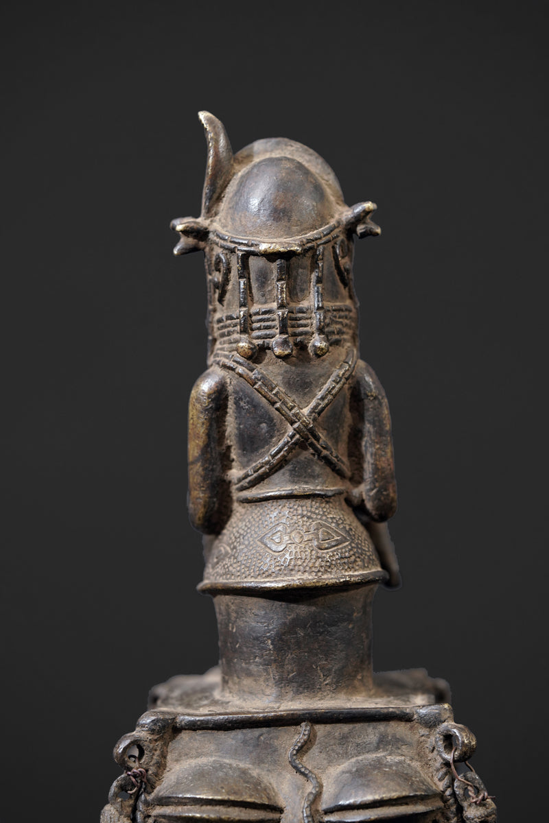 A bronze bell in the style of Benin