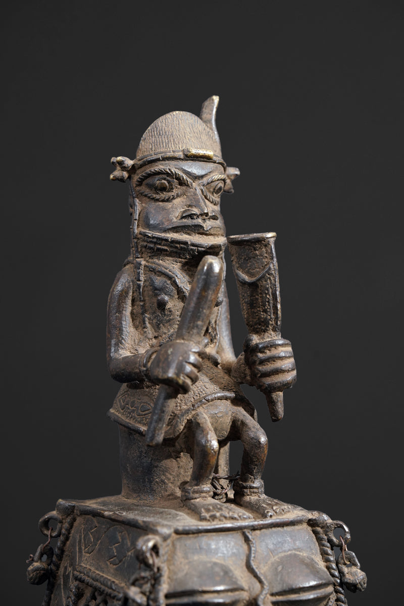 A bronze bell in the style of Benin