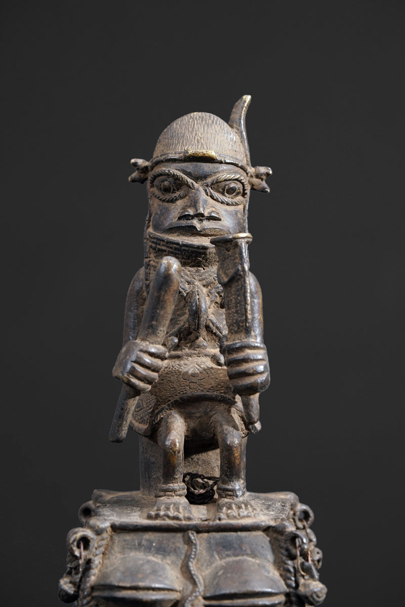 A bronze bell in the style of Benin