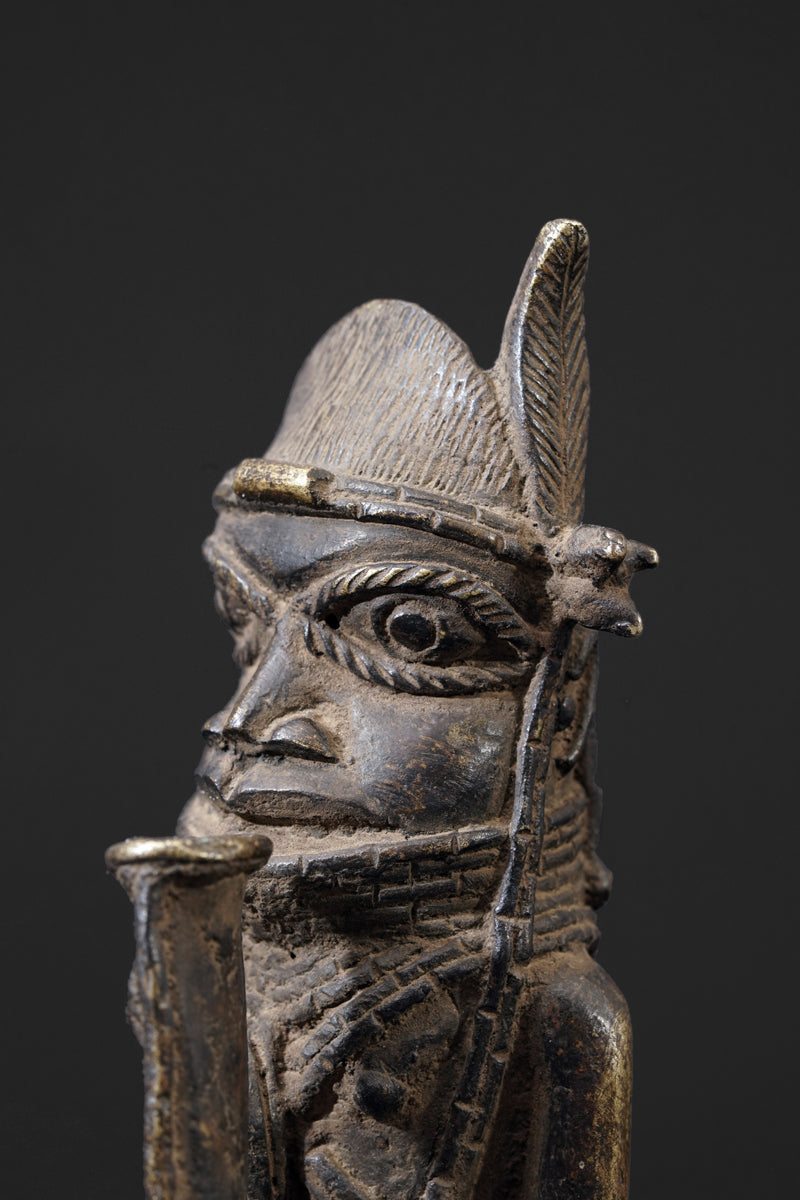 A bronze bell in the style of Benin