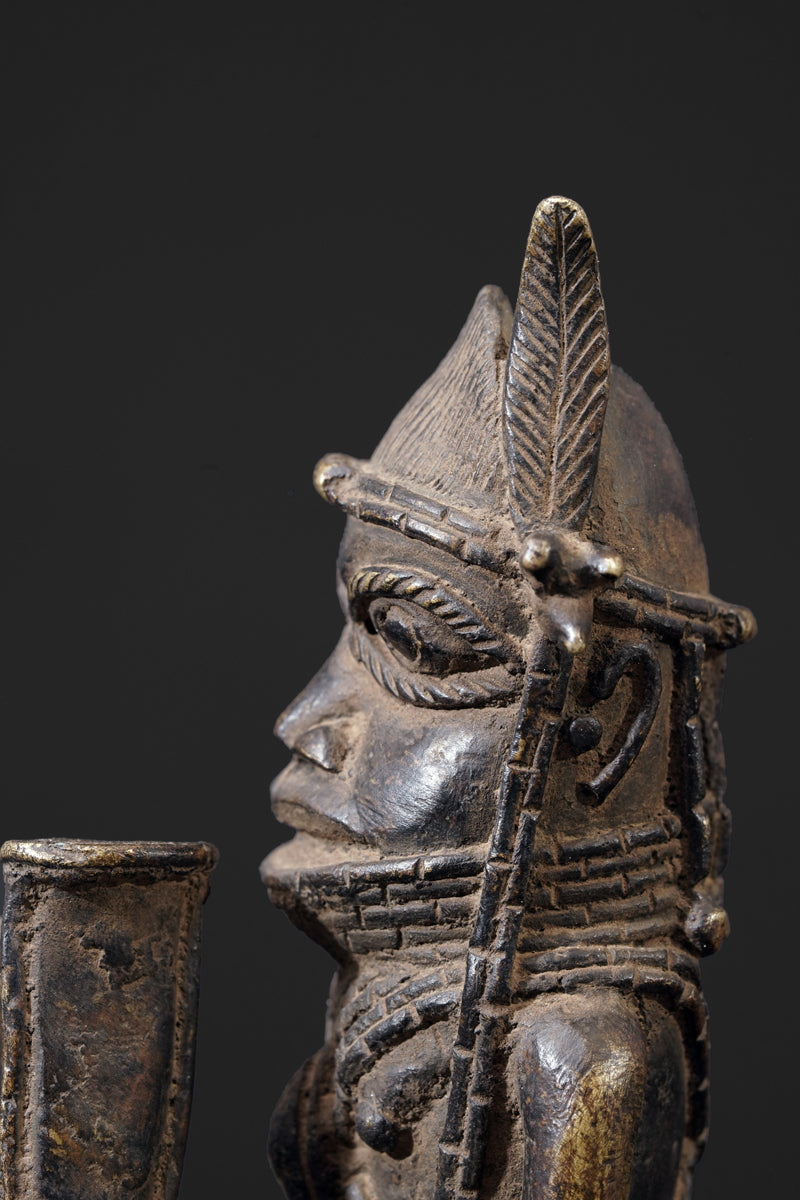 A bronze bell in the style of Benin