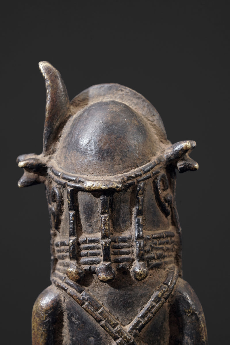 A bronze bell in the style of Benin