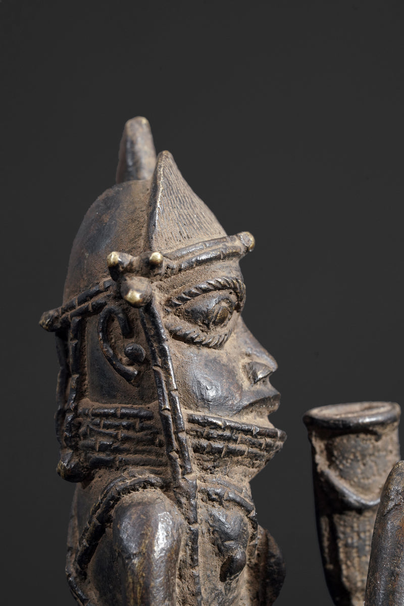 A bronze bell in the style of Benin