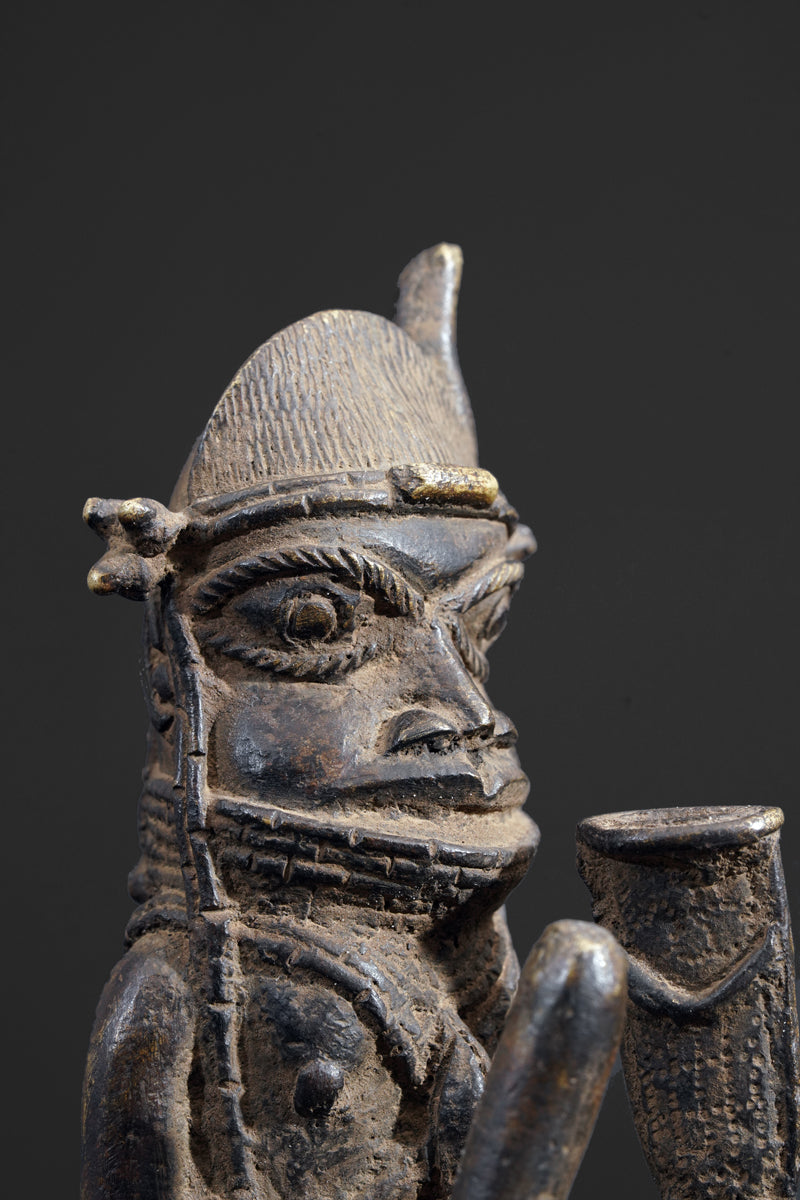 A bronze bell in the style of Benin
