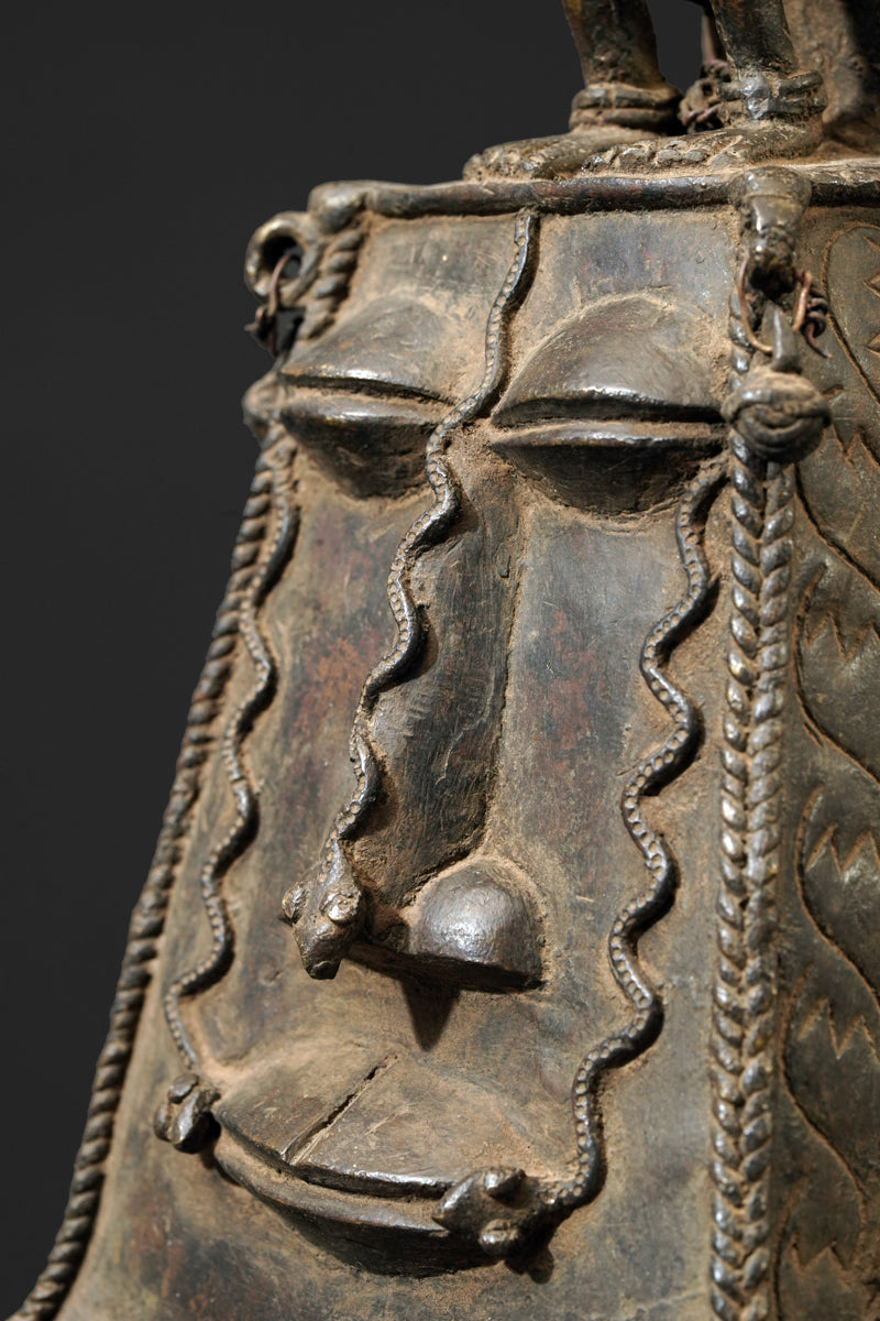 A bronze bell in the style of Benin