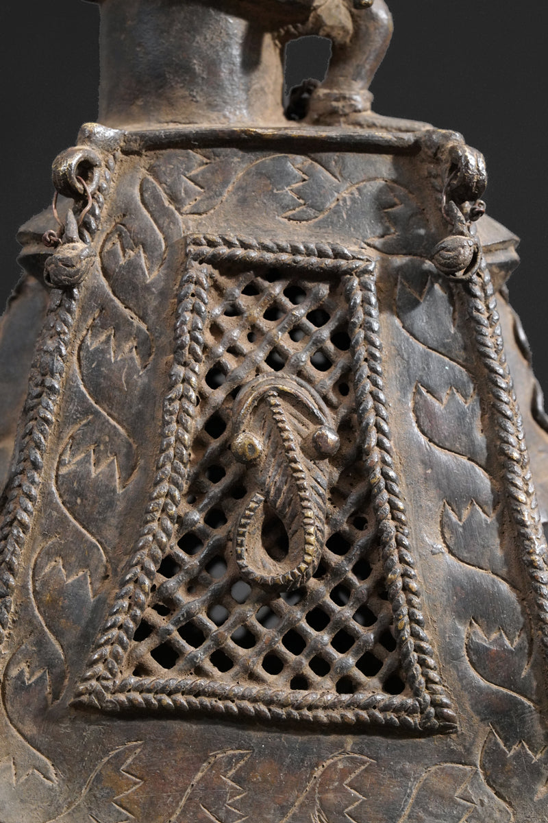 A bronze bell in the style of Benin
