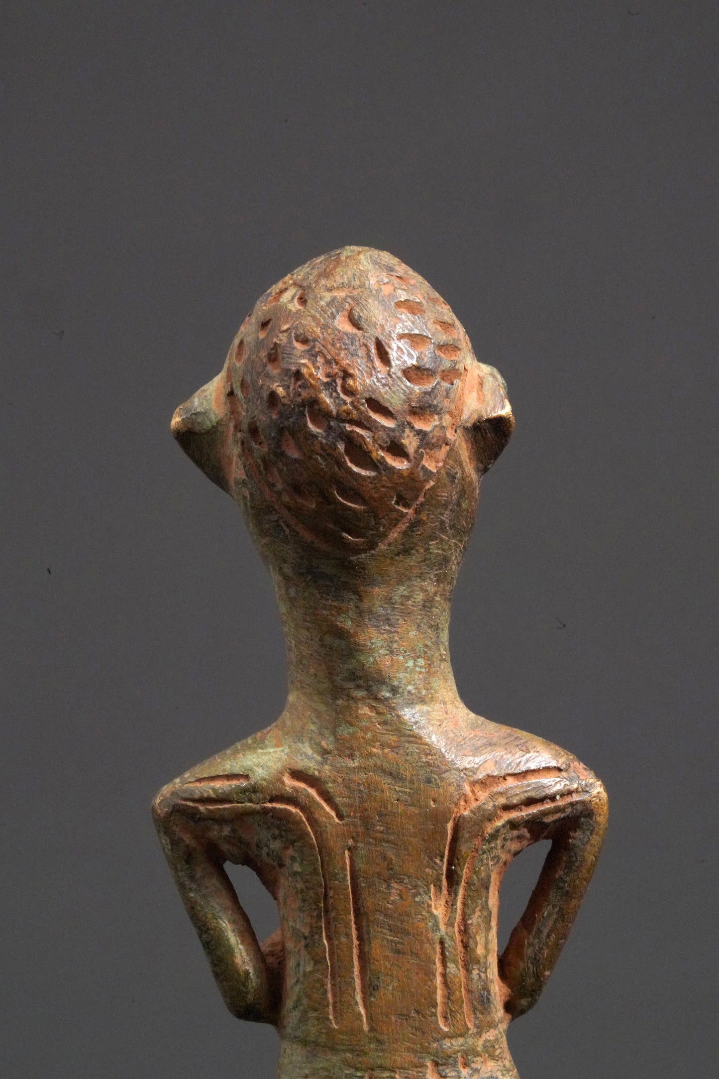 A male Yoruba metal sculpture